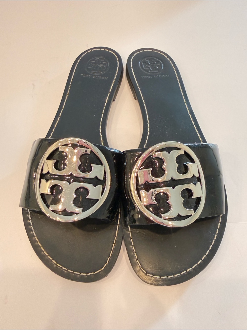 Tory Burch Black Patent Slide Sandals with Silver Logo Medallions